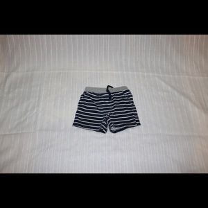 Blue and white striped baby shorts.